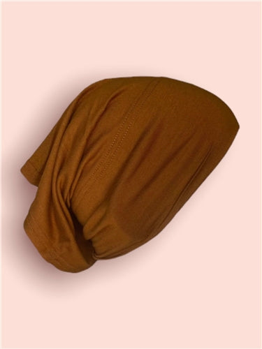UNDER - CAPS